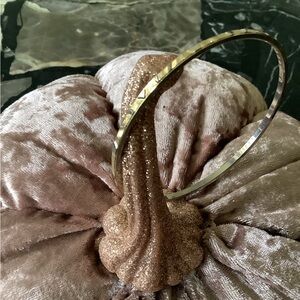 Unknown gold-tone etched engraved symbol bracelet anyone know what symbols are?